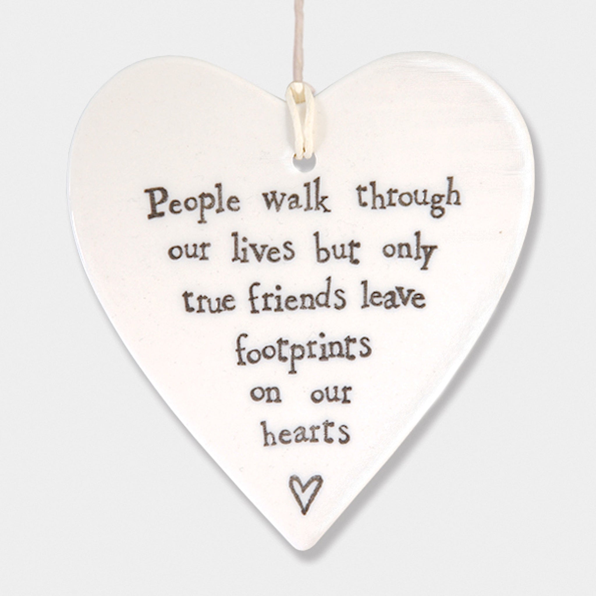 People walk through our lives but only true friends leave footprints on our heart
