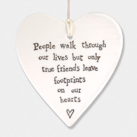 People walk through our lives but only true friends leave footprints on our heart